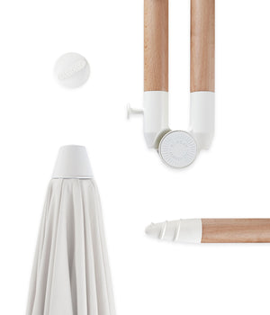 Close up on a Sunday Supply Co beach umbrella's joints and hardware details.