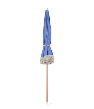 Sunday Supply Co Pacific beach umbrella closed and wrapped.